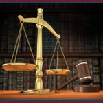 Scales of justice next to a gavel